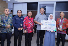 Salurkan Santunan JKM dan Beasiswa
