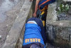 Petugas UPTD Damkar Gelar Kegiatan Gotong Royong Bersama Warga