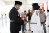 Bupati Enos Resmi Kukuhkan 40 Anggota Paskibraka Tahun 2025